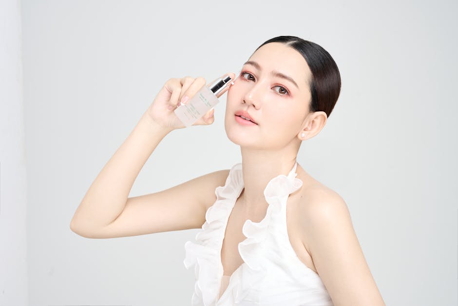 Serene model holding skincare product in modern beauty photoshoot